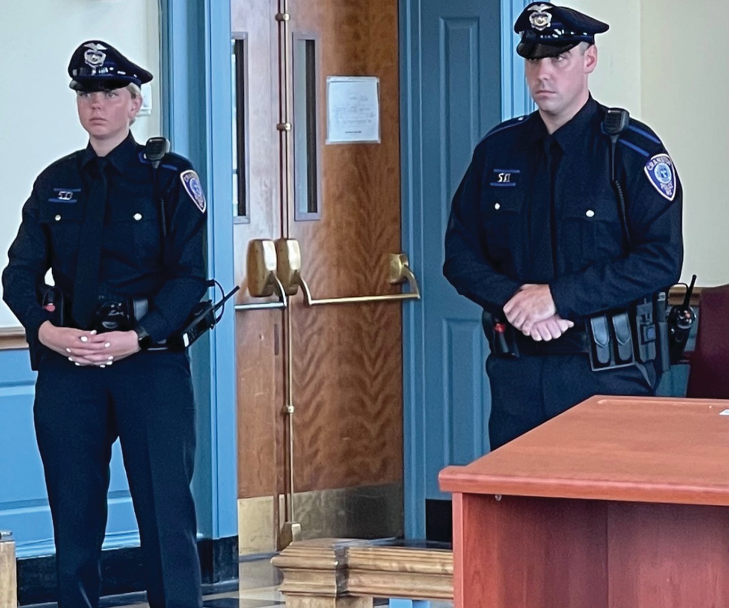 JOINING THE RANKS: Officers Kayleigh Cooper, left, and Brian Brothers were sworn in as members of the Cranston Police Department during a ceremony held last week at City Hall.